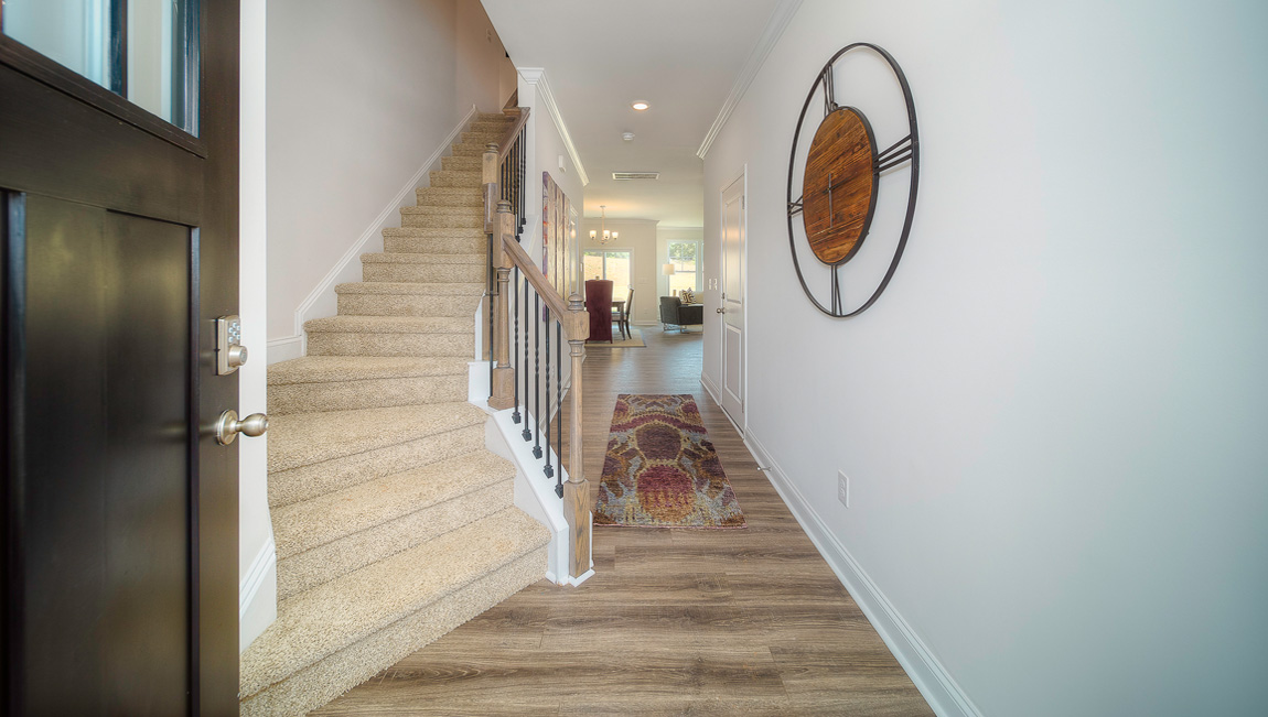 Welcoming foyer, view of interior hallway and stairs
