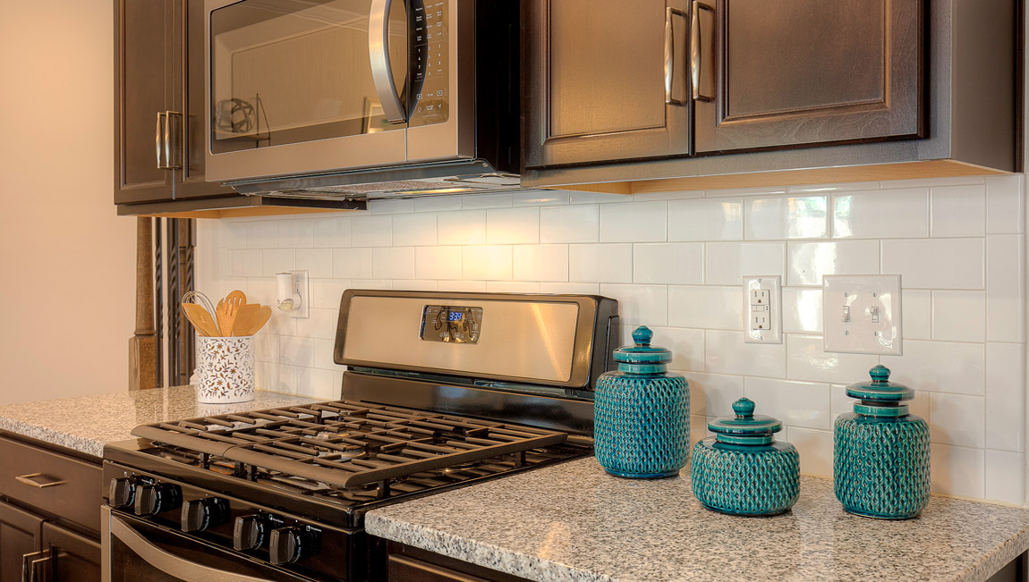 Open kitchen with island and stainless steel appliances