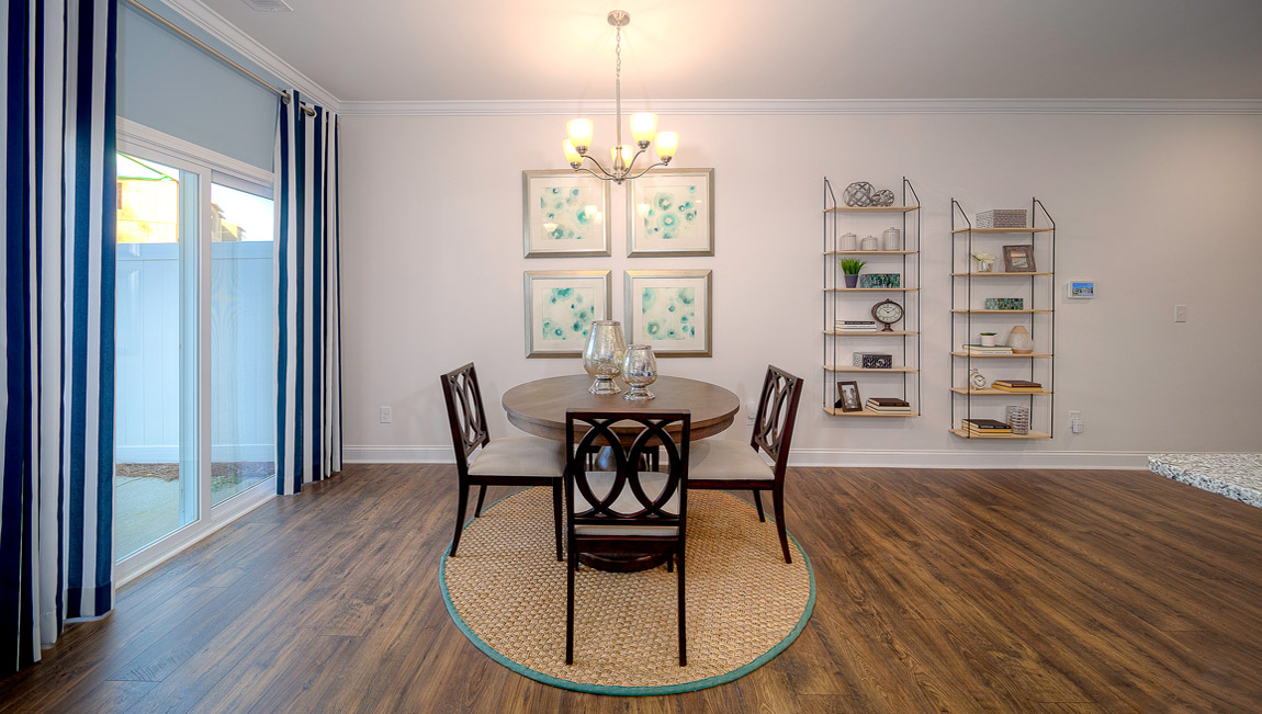Open dining area with sliding glass door