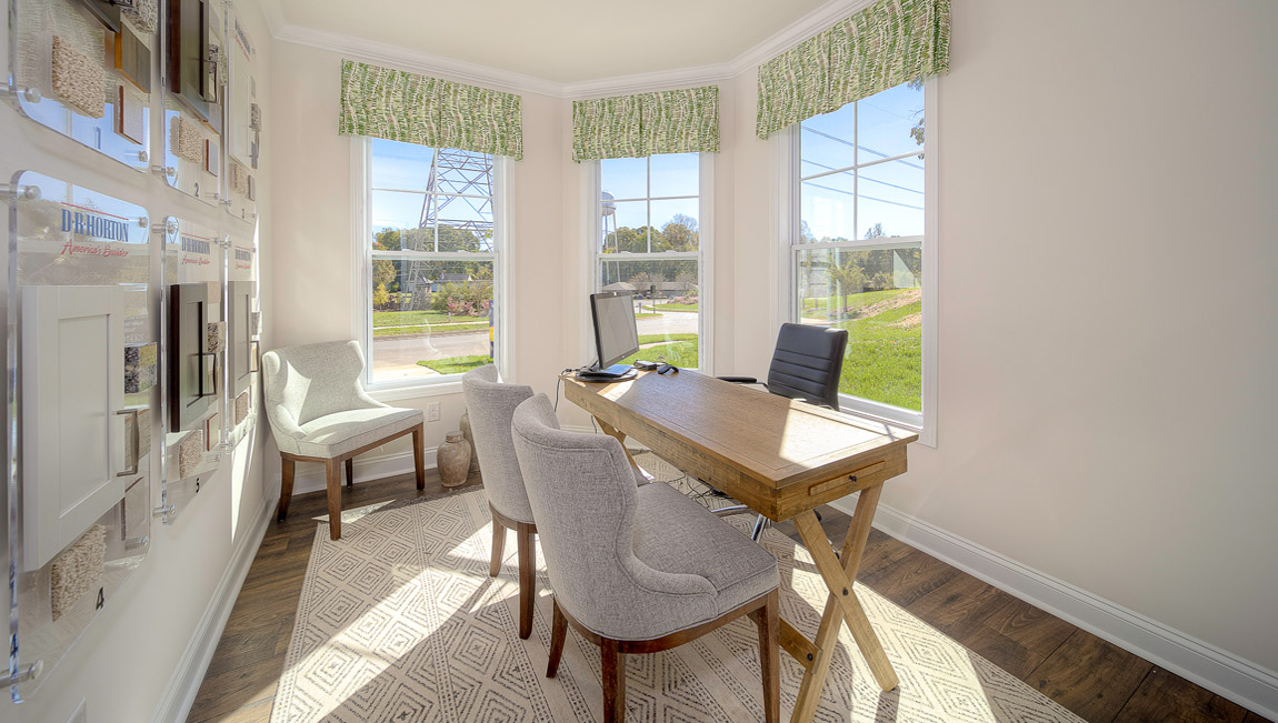 Office or den with multiple windows