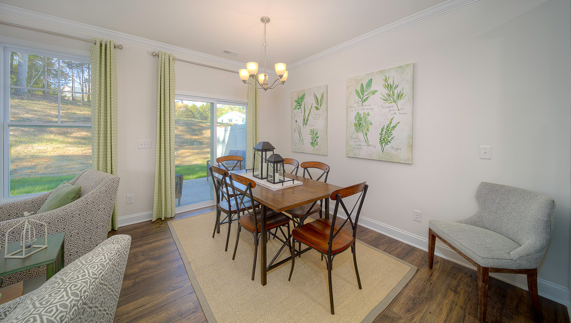 Open dining area with sliding glass door