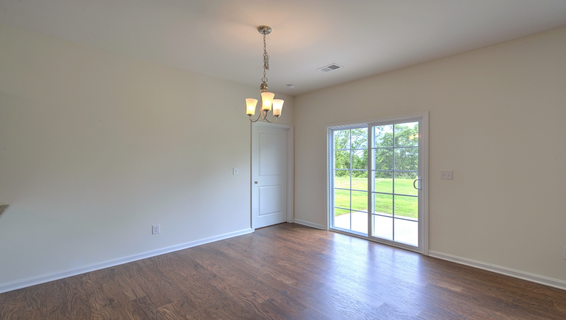 Dining space with glass doors to patio