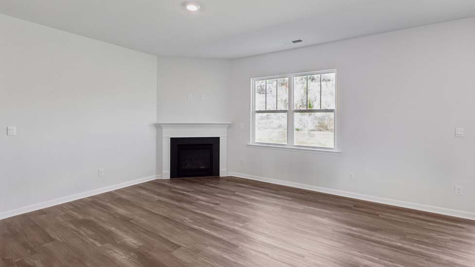Open living area with electric fireplace
