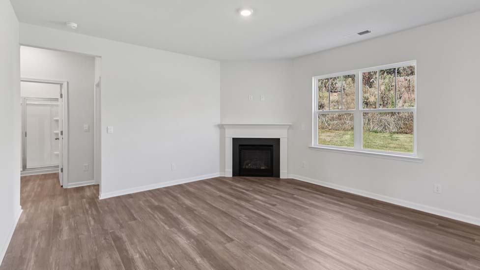 Open living area with electric fireplace