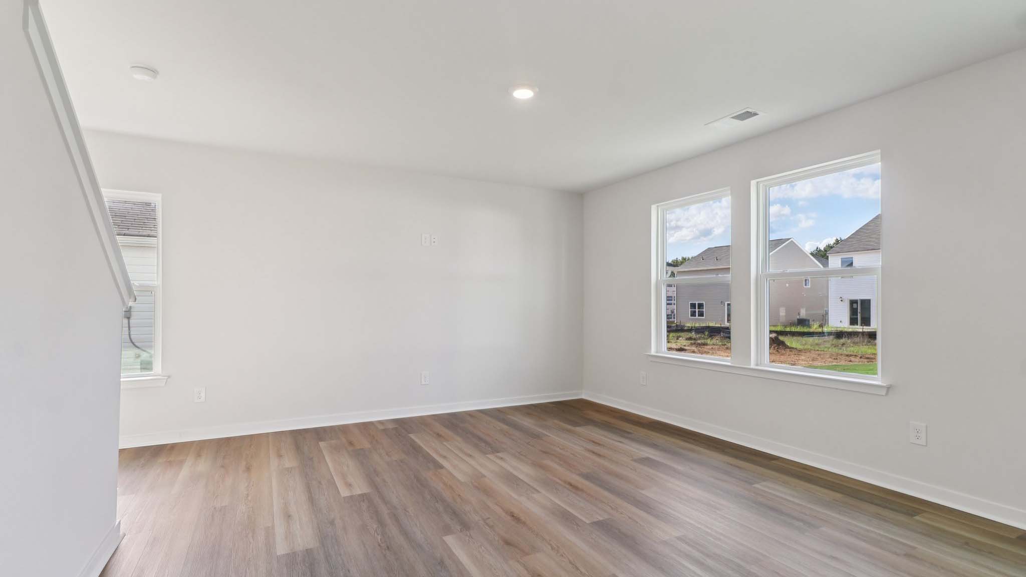 Open living room area with large windows