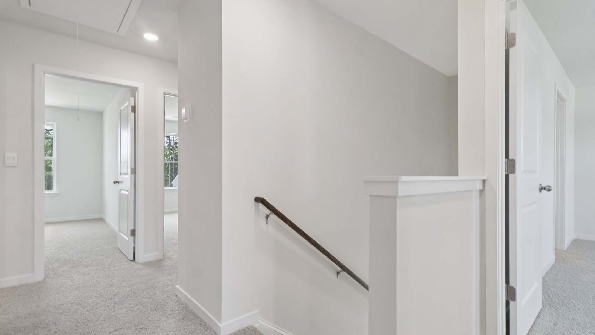 Carpeted landing area upstairs