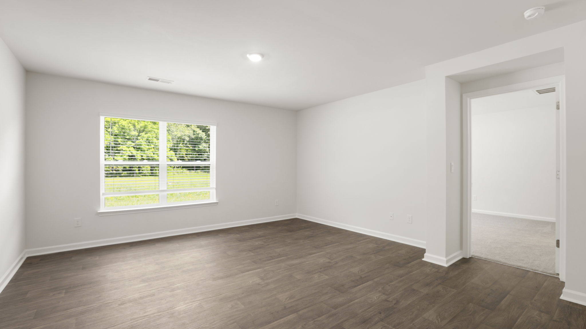 Open living room area with large windows