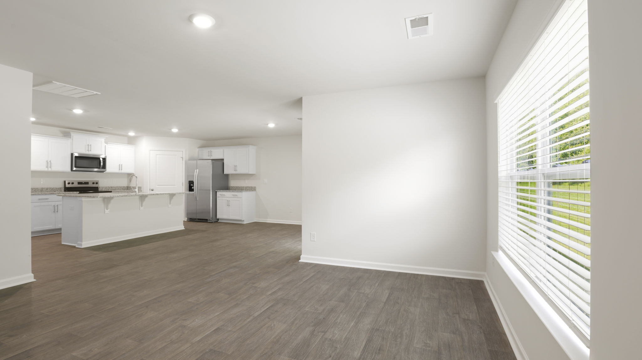 Open living room area with large windows