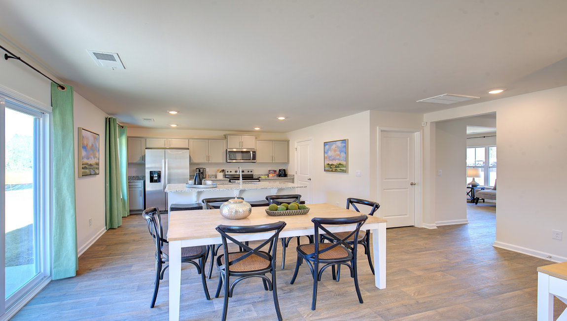Open breakfast area with sliding glass doors