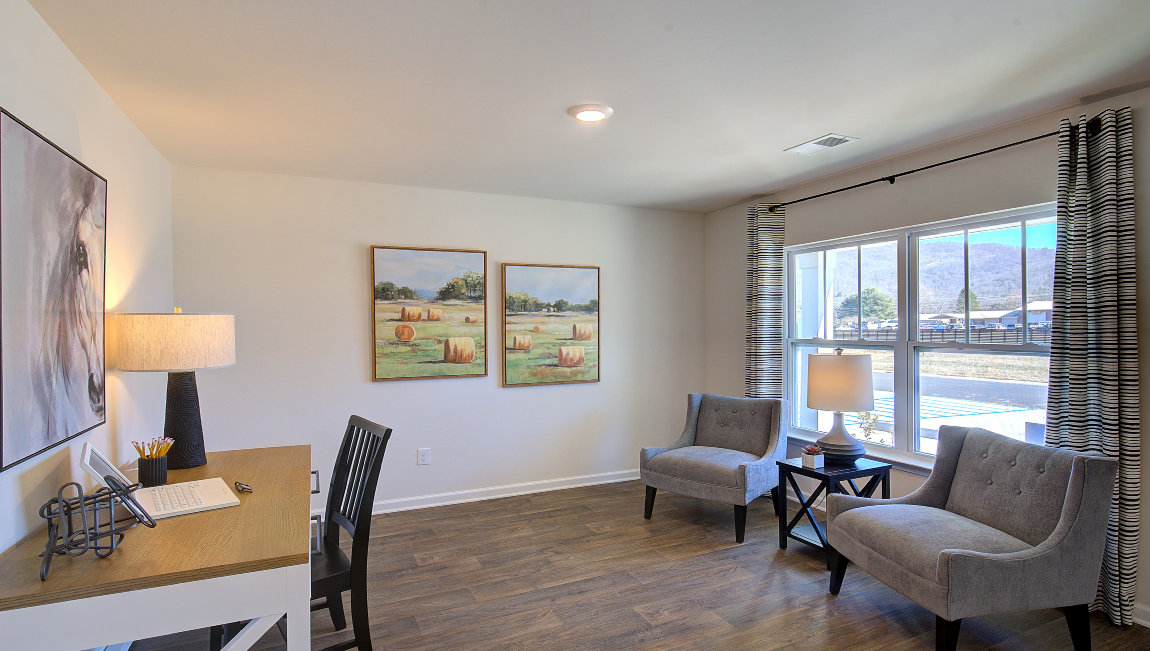 Front flex room with large windows
