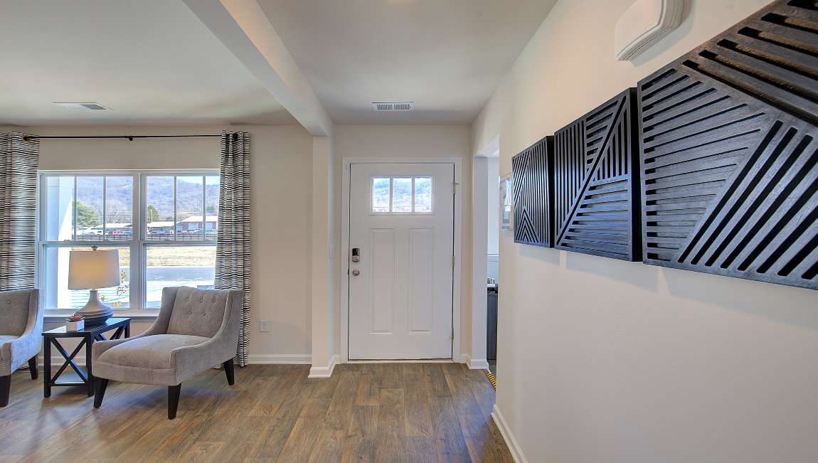 Welcoming foyer area with view of flex space