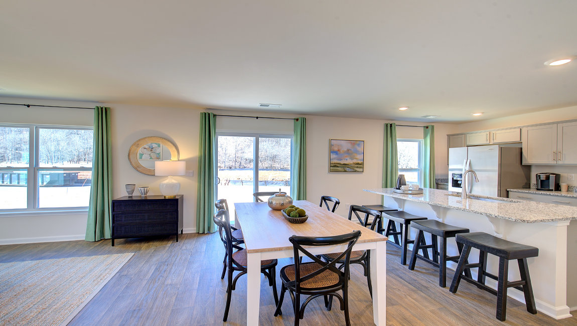 Open breakfast area with sliding glass doors