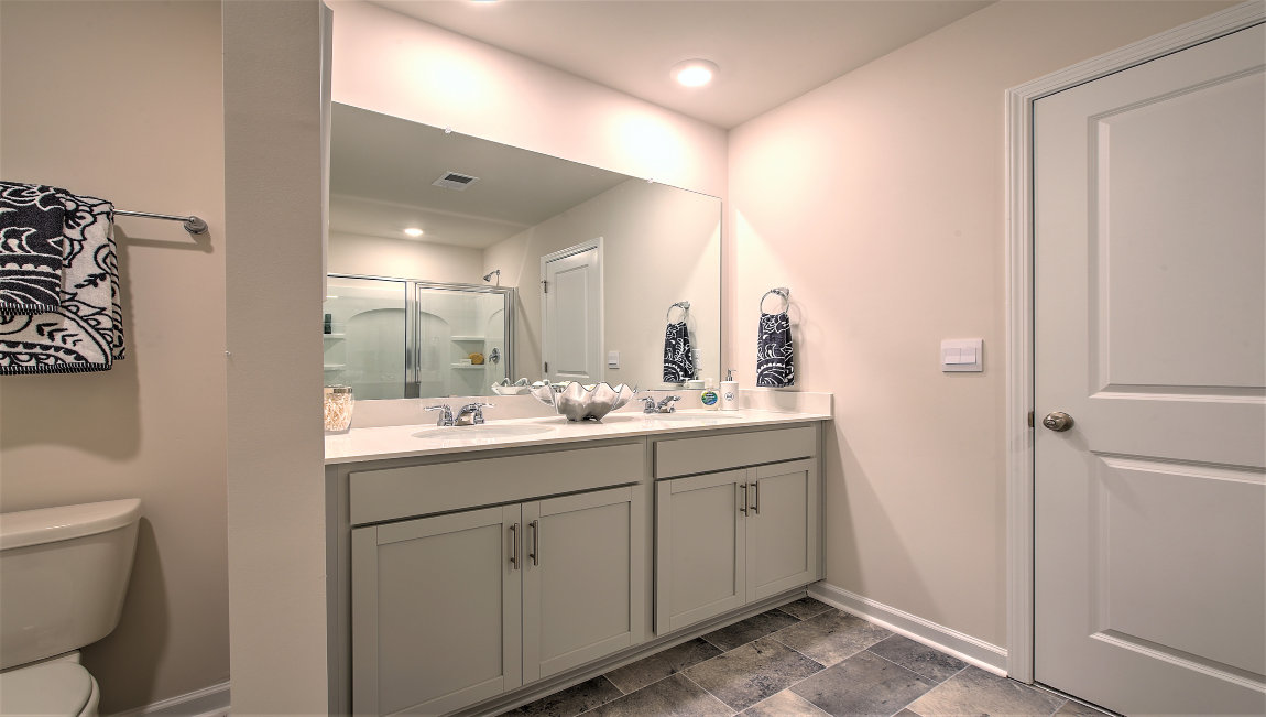 Primary bathroom with glass door shower