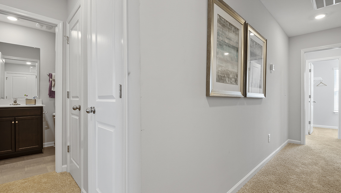 Hallway with view of bedroom