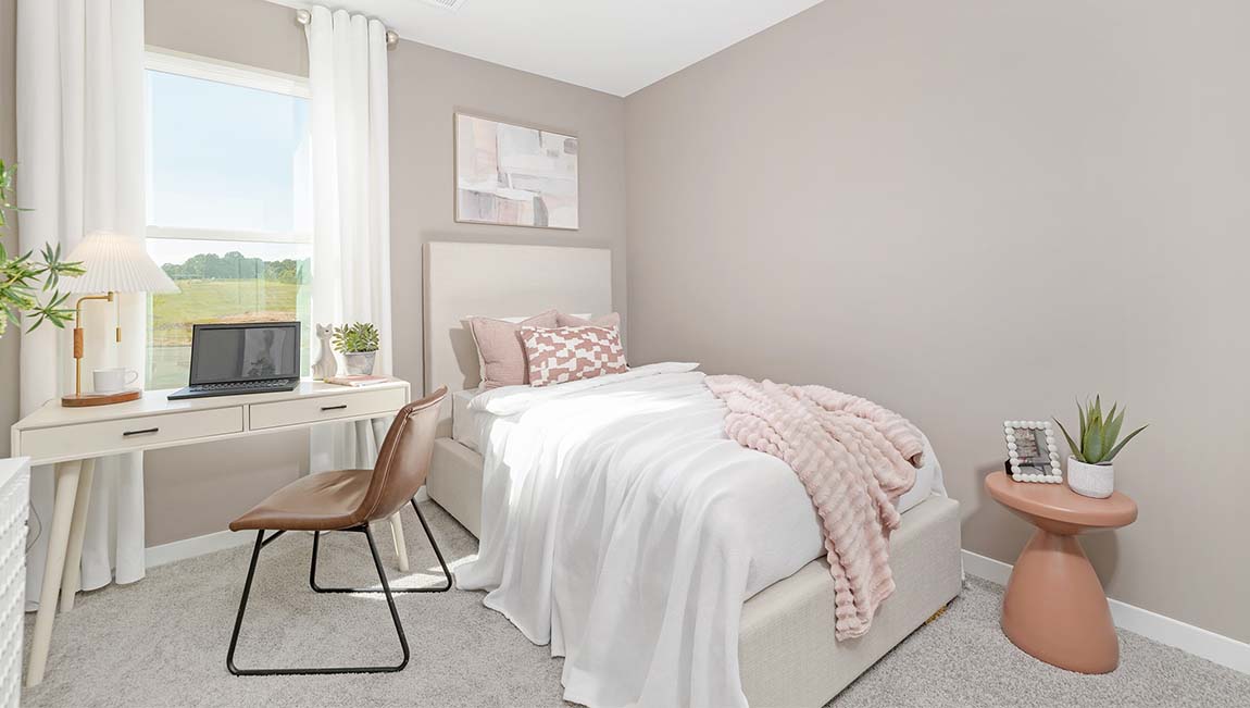Carpeted bedroom with window