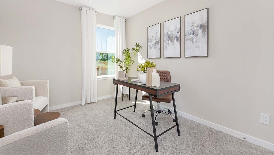 Carpeted bedroom with window
