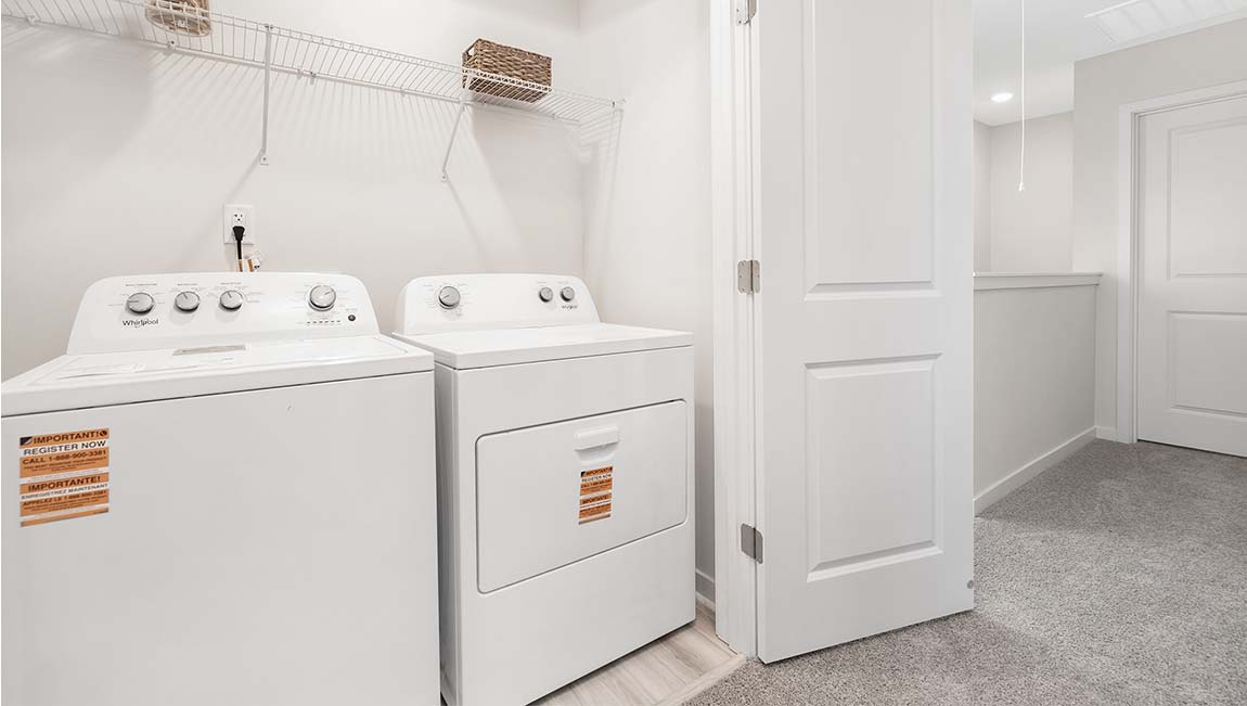 Laundry room with shelving