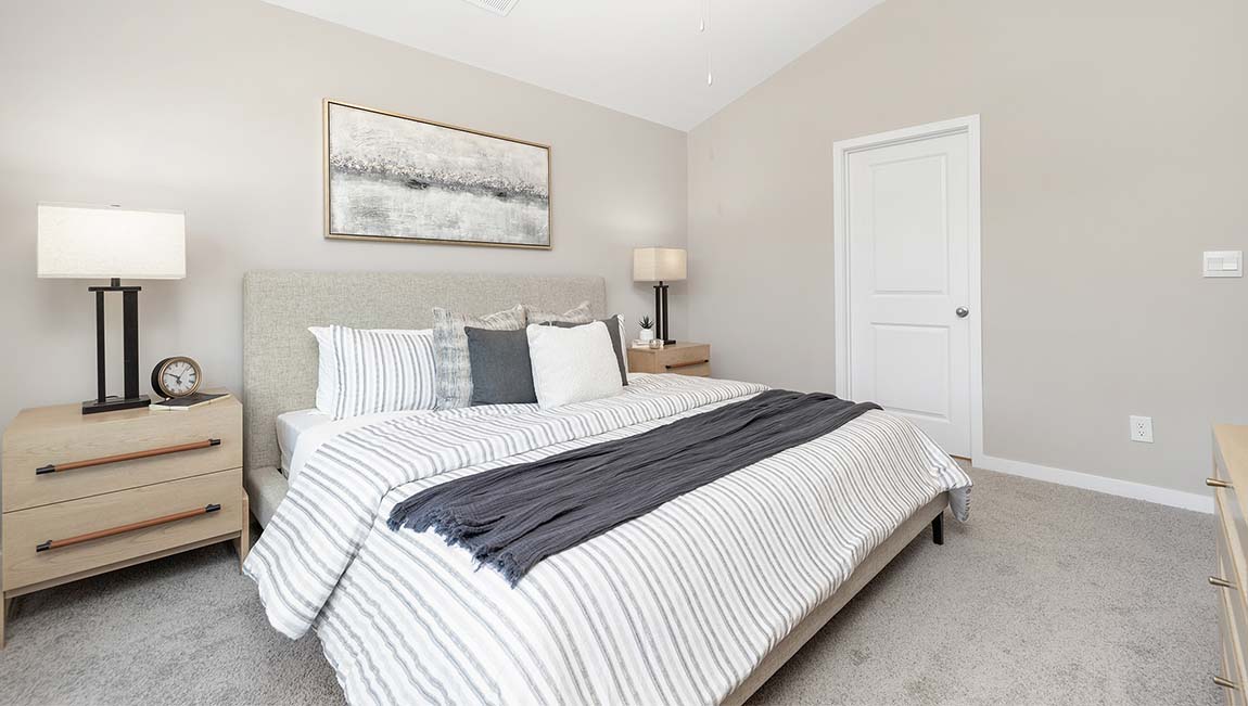 Carpeted primary bedroom