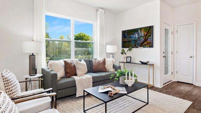 Open living room space with large windows