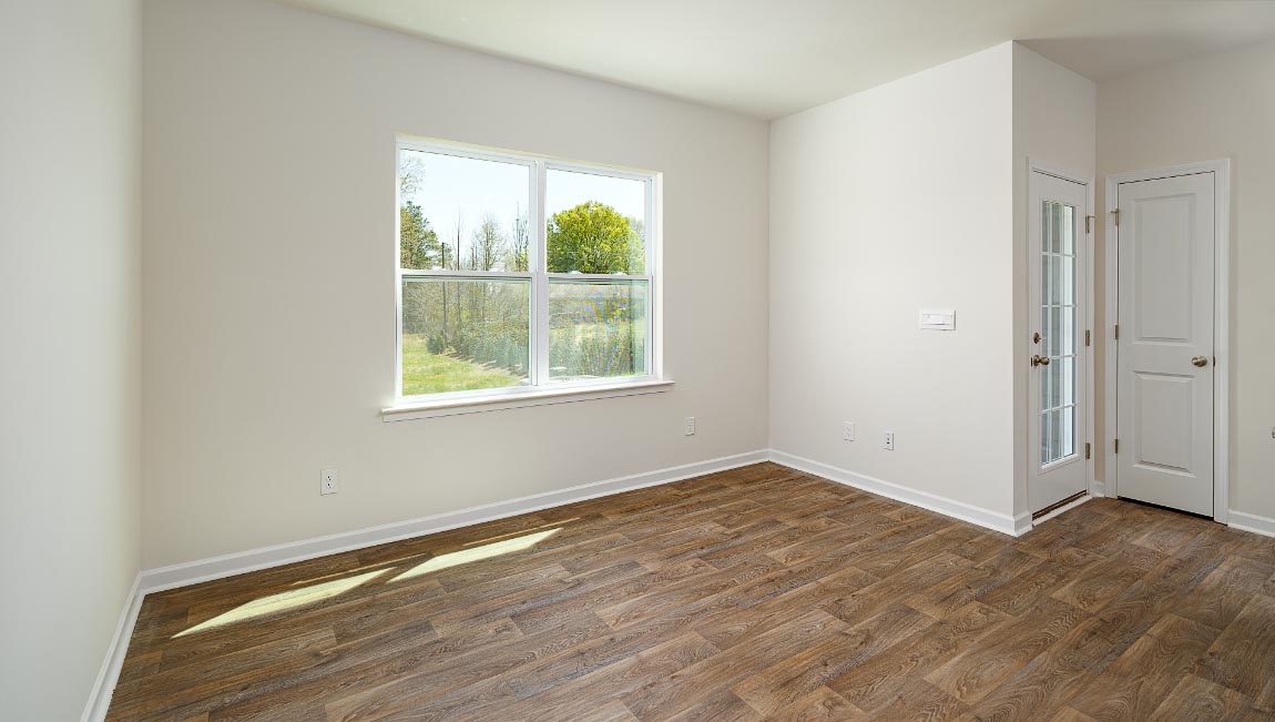 Open dining area with large windows