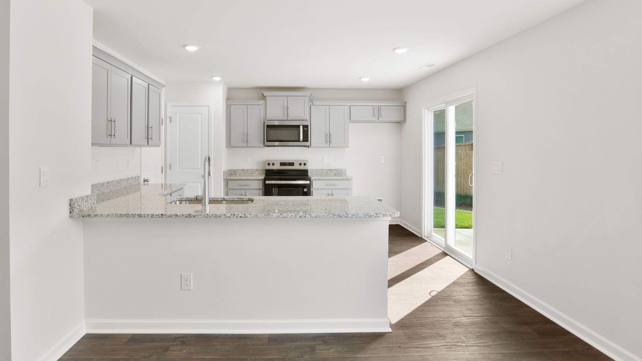 Open dining area with large windows