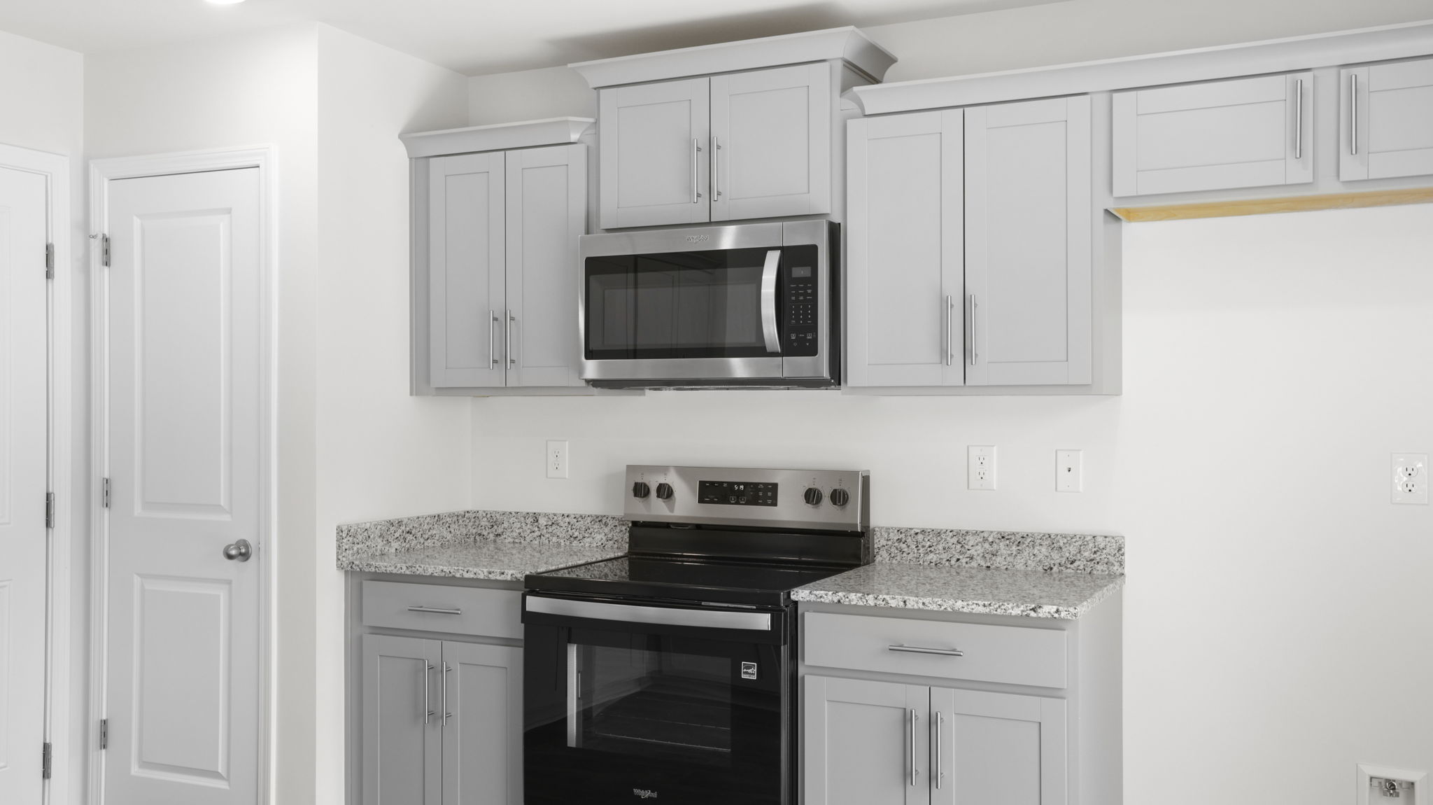 Open kitchen with stainless steel appliances