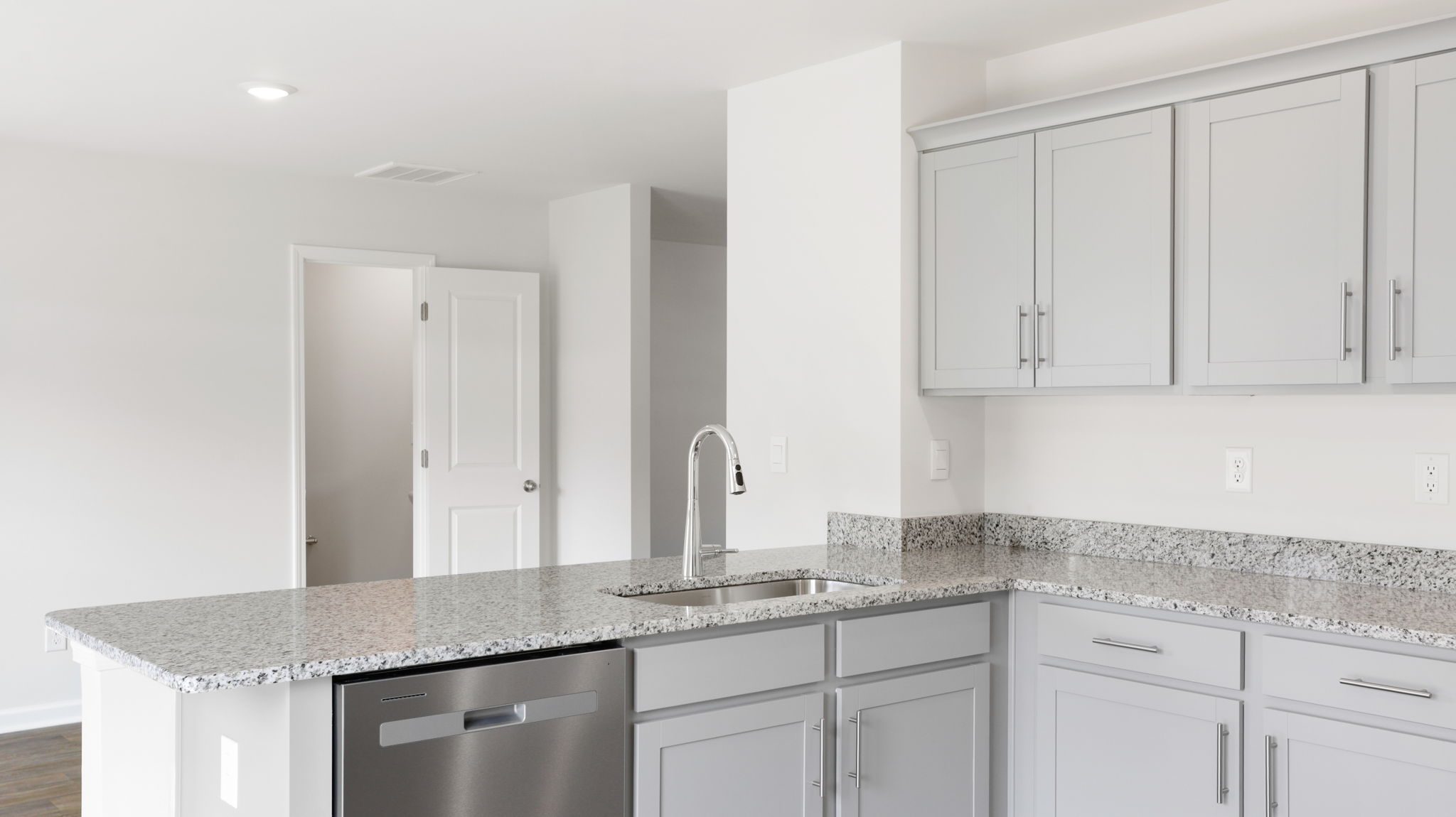 Open kitchen with stainless steel appliances