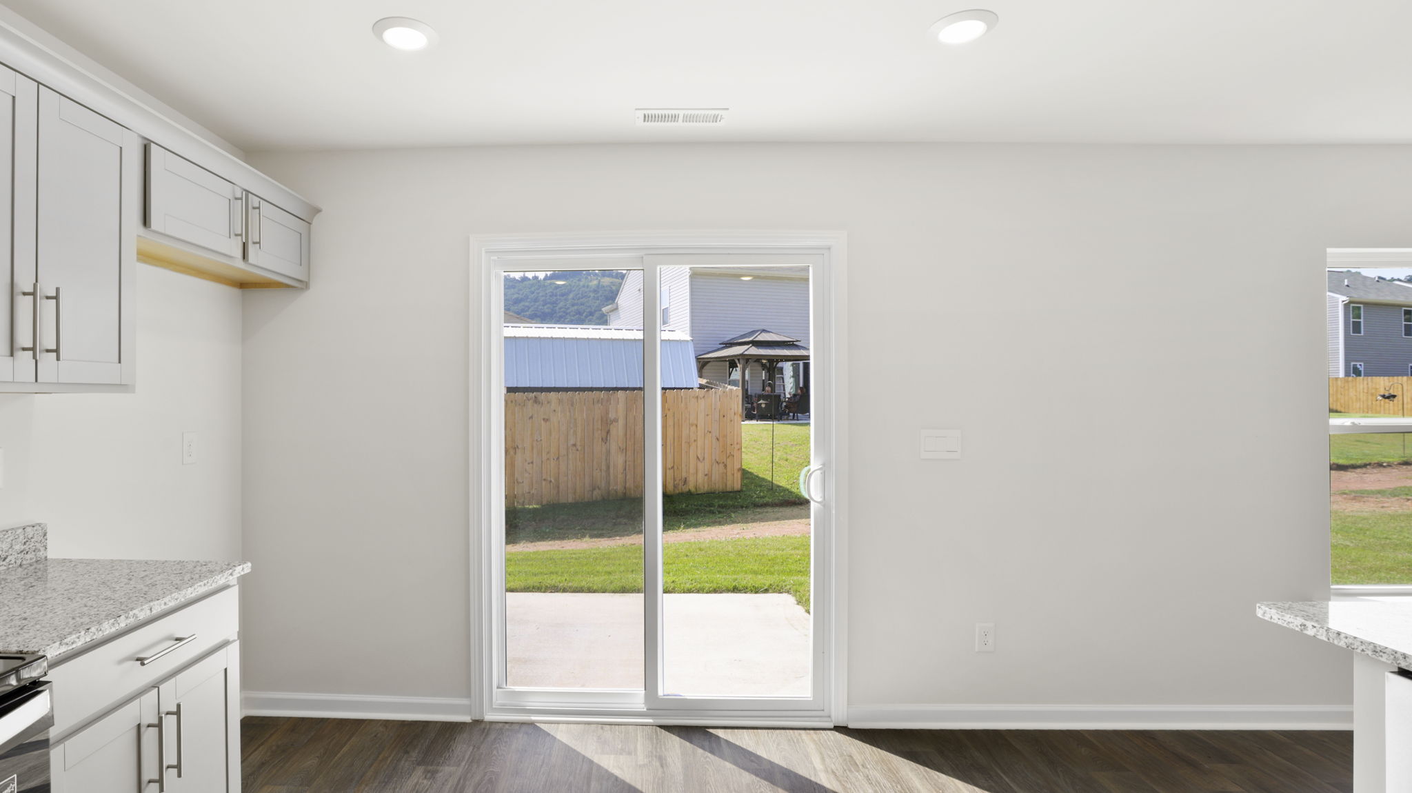 Open dining area with large windows