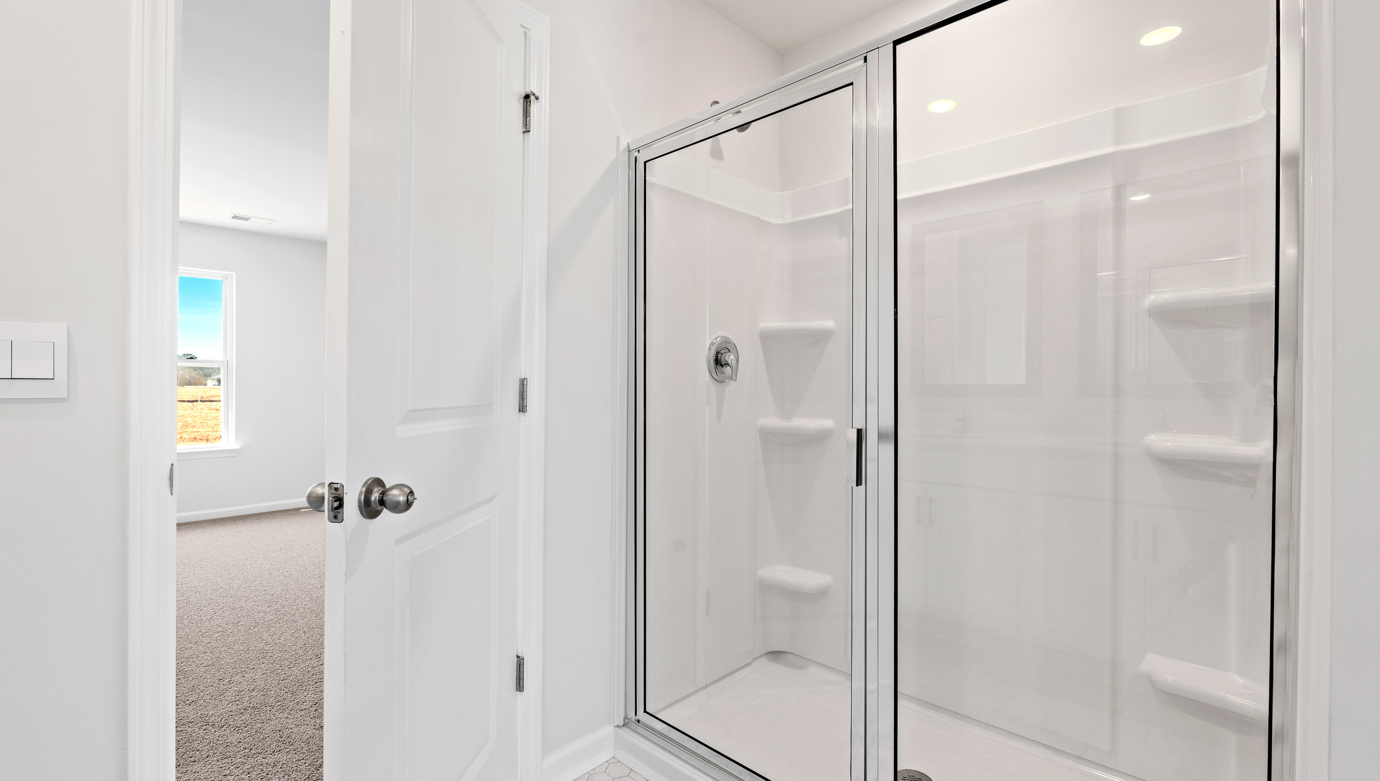Walk in shower with glass doors