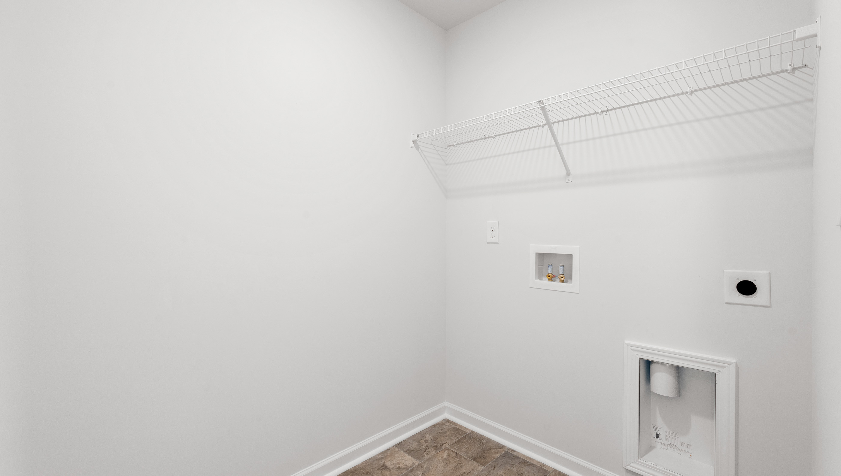 Laundry room with shelving