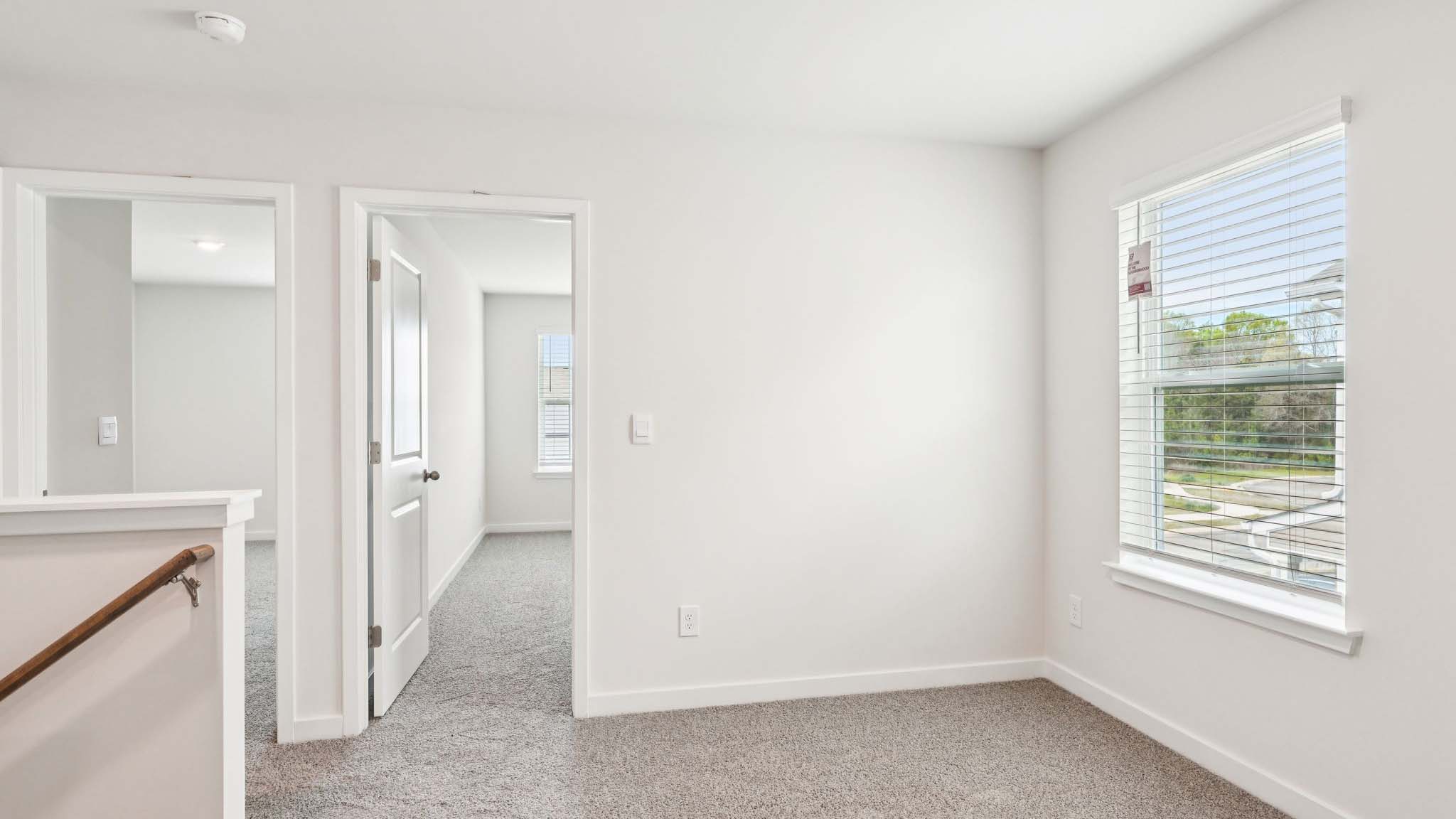 Upstairs landing area with window