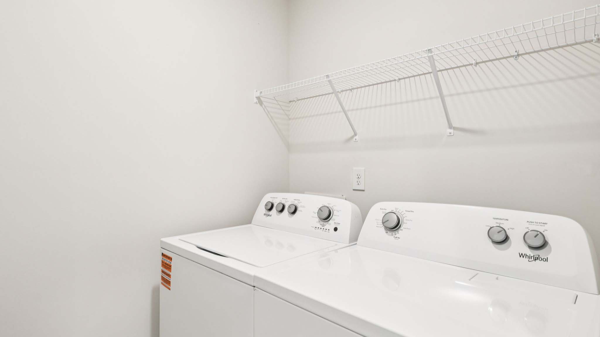 Laundry room with washer and dryer