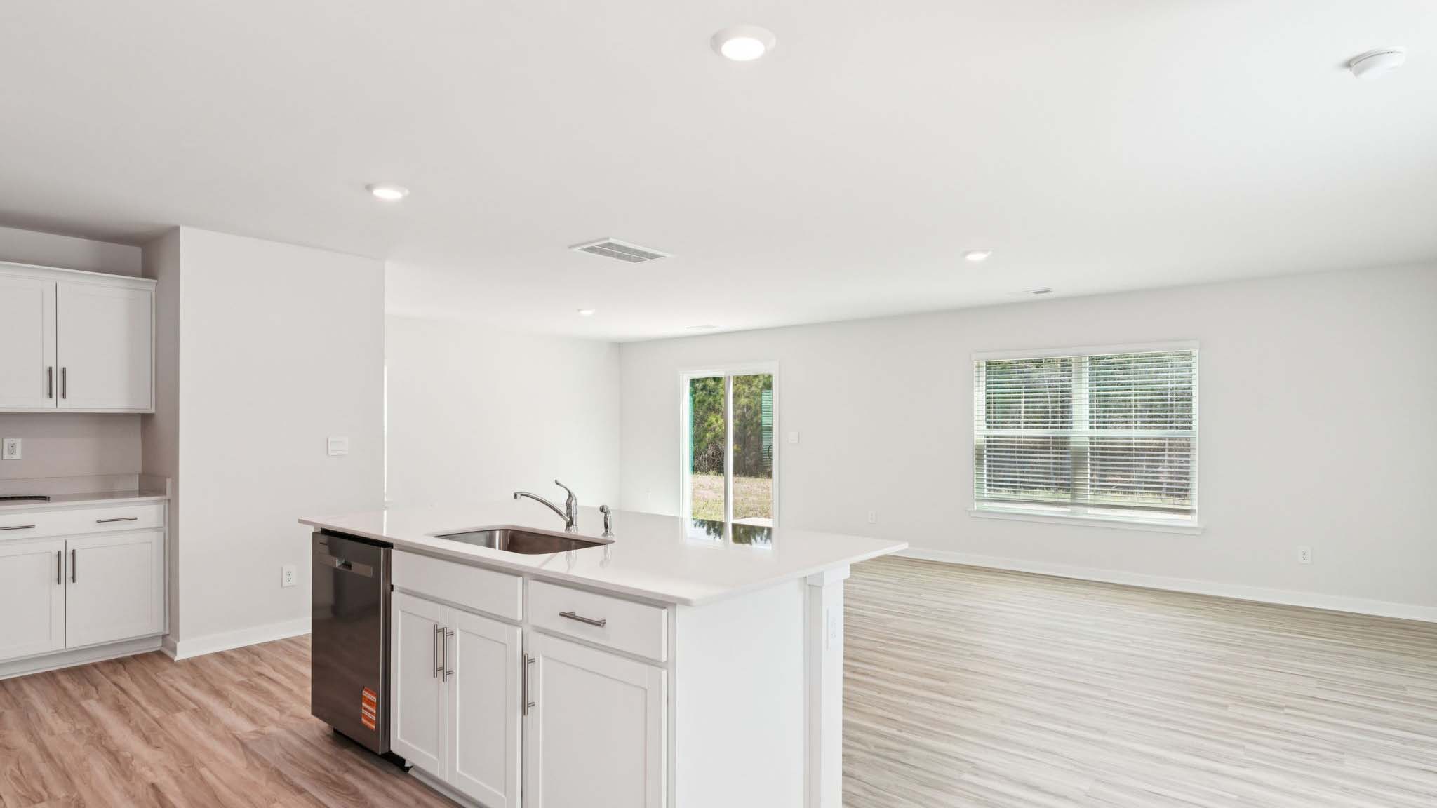 Open living area with view of kitchen
