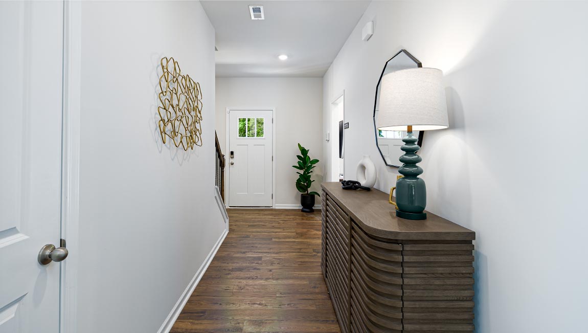 Welcoming foyer with view of front door. New Home in Asheville, North Carolina