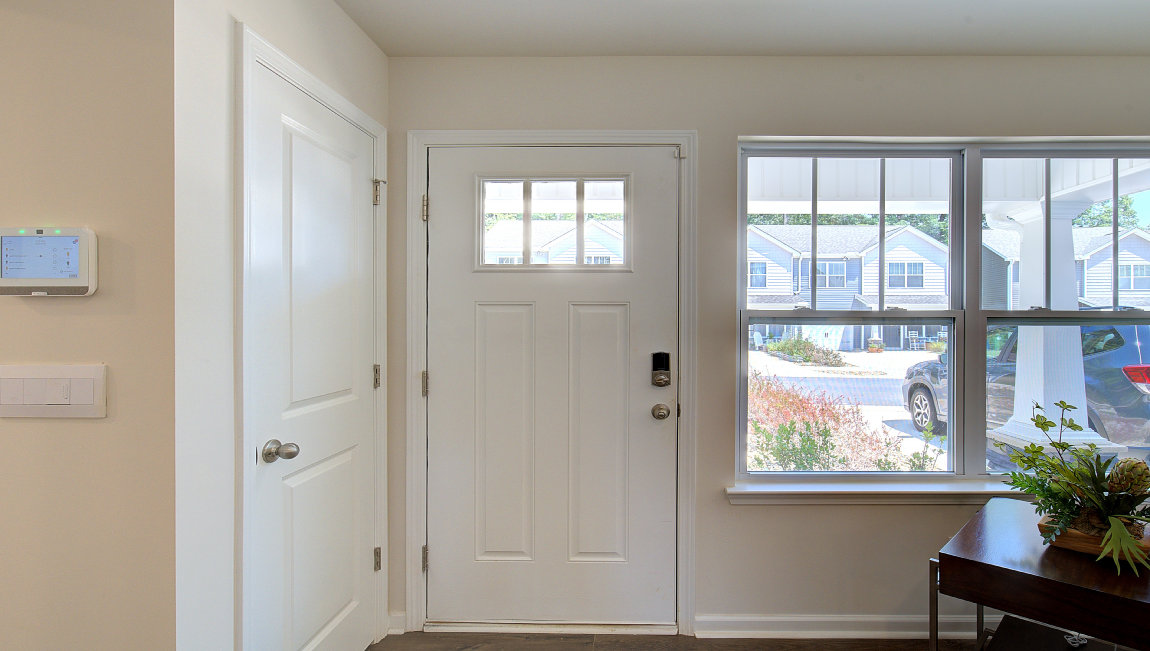 Entryway with view of from doorway and large window. New Homes in Asheville, North Carolina