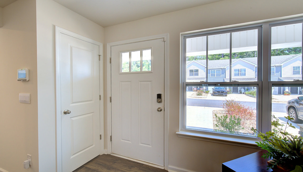 Entryway with view of from doorway and large window. New Homes in Asheville, North Carolina