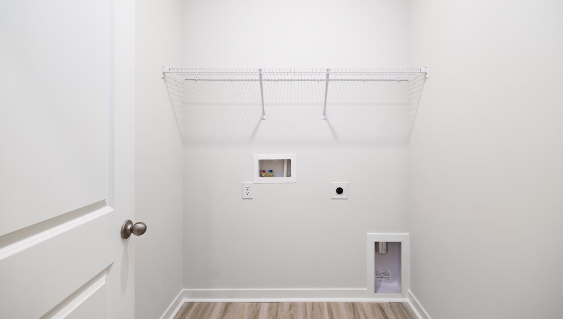 Laundry room with shelving