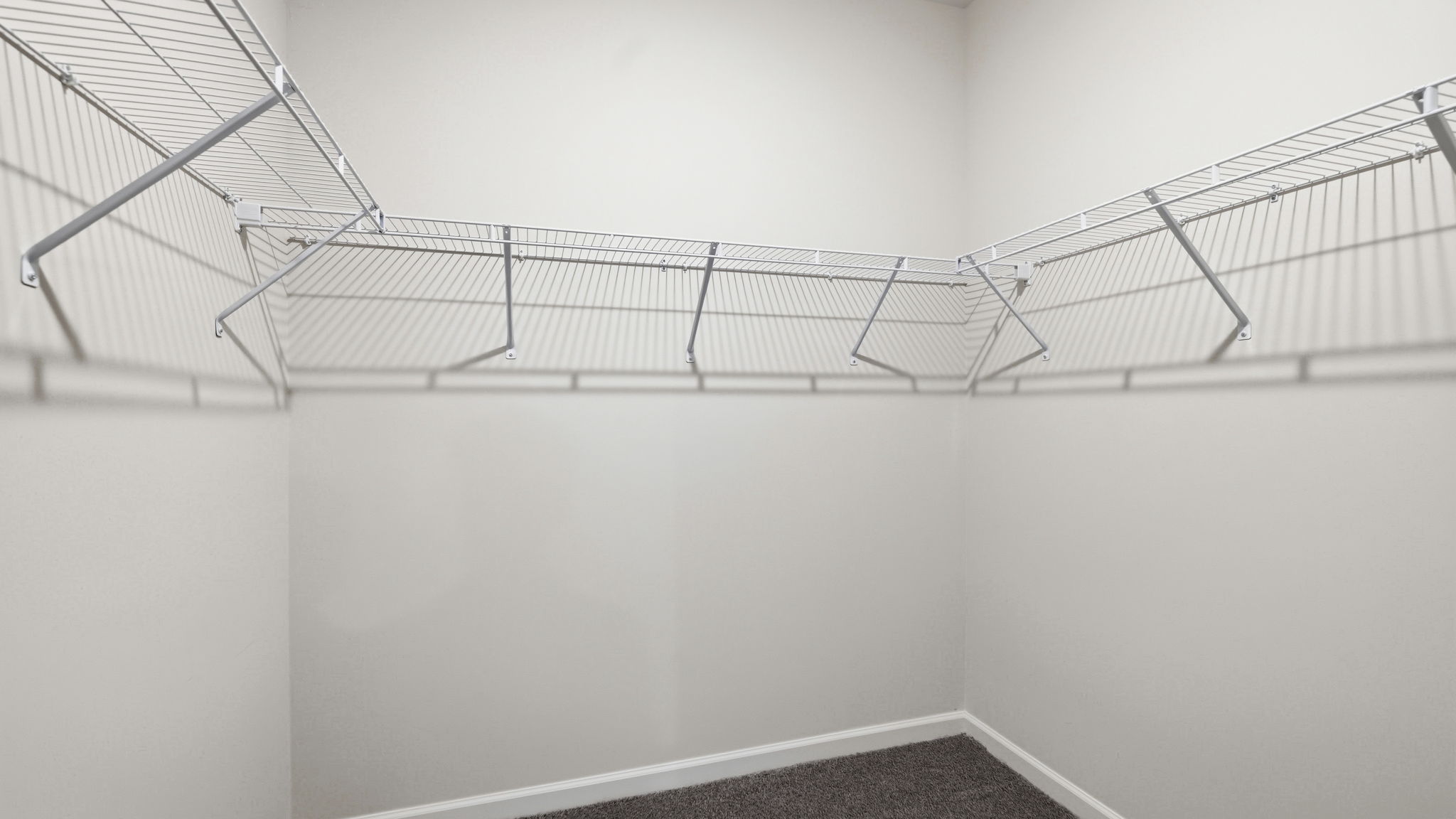 Walk in closet with built in shelving