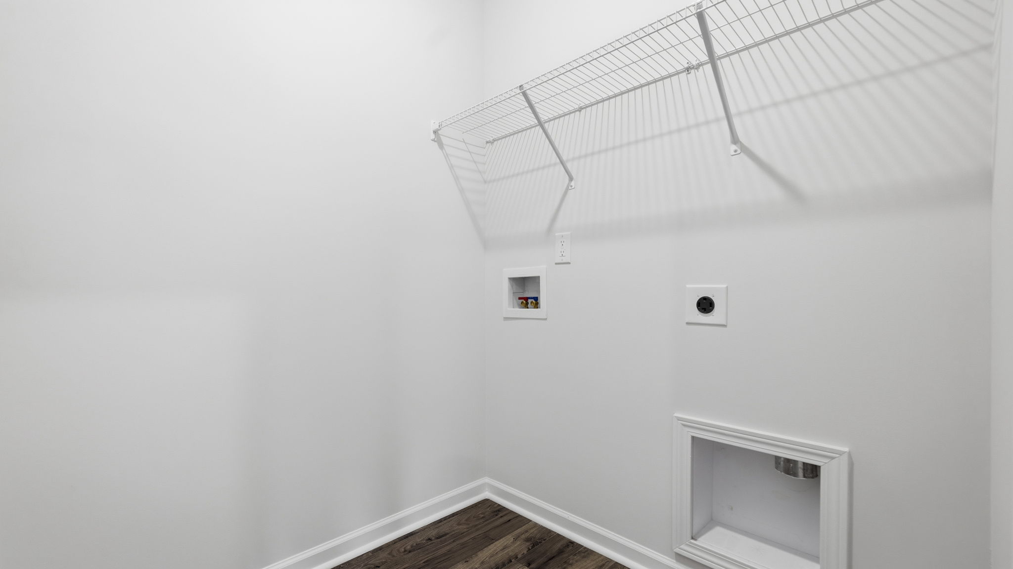 Laundry room with built in shelving