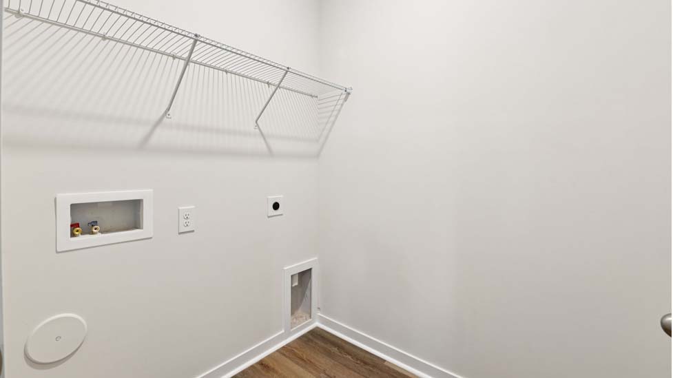 Laundry room with shelving