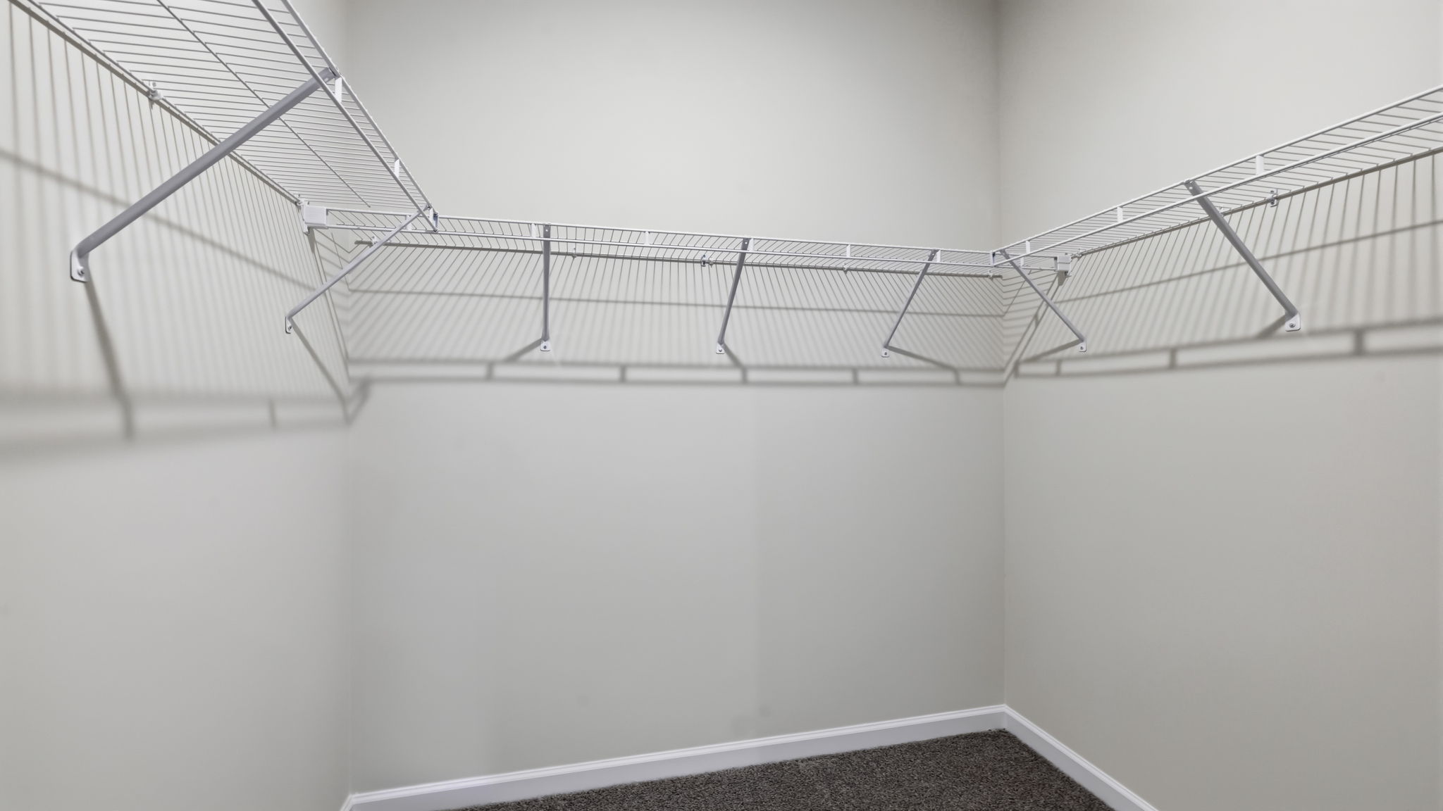 Walk in closet with built in shelving