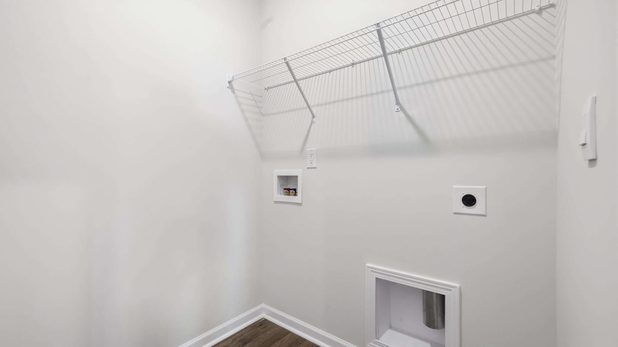 Laundry room with built in shelving