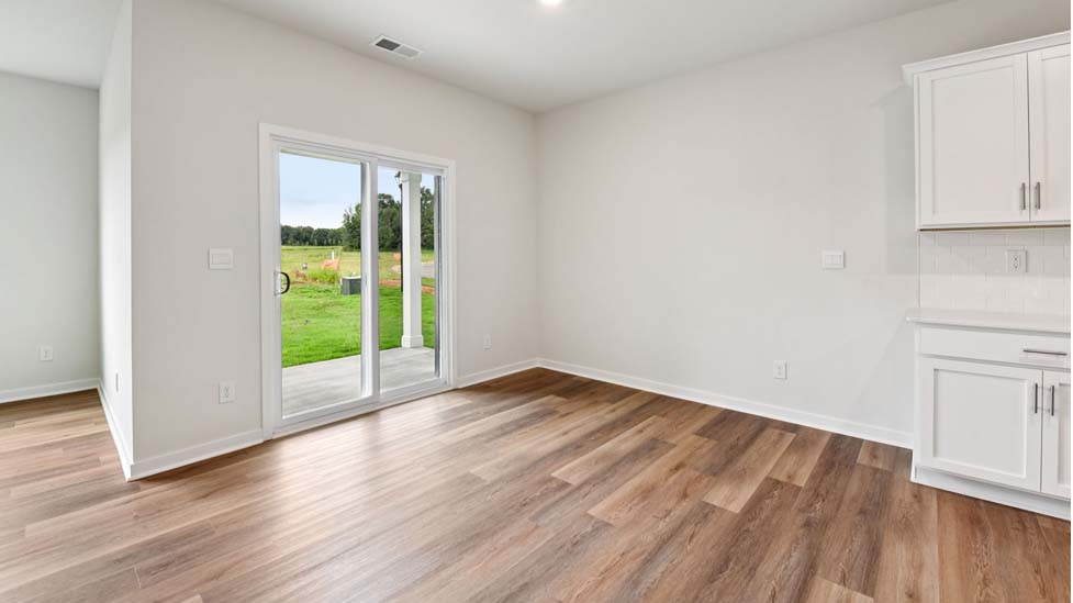 Open living area with sliding glass door
