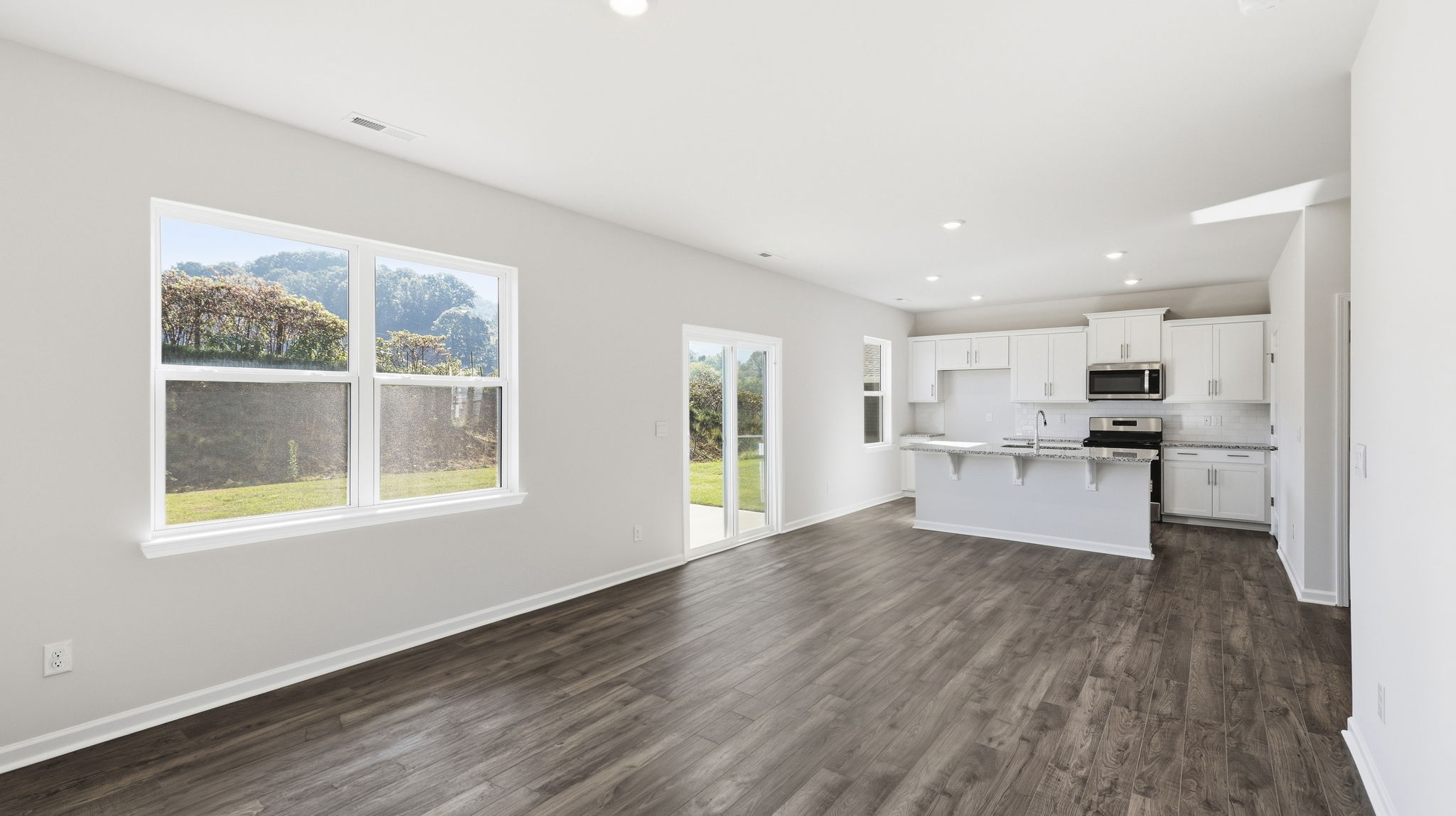 Open living room area with large windows