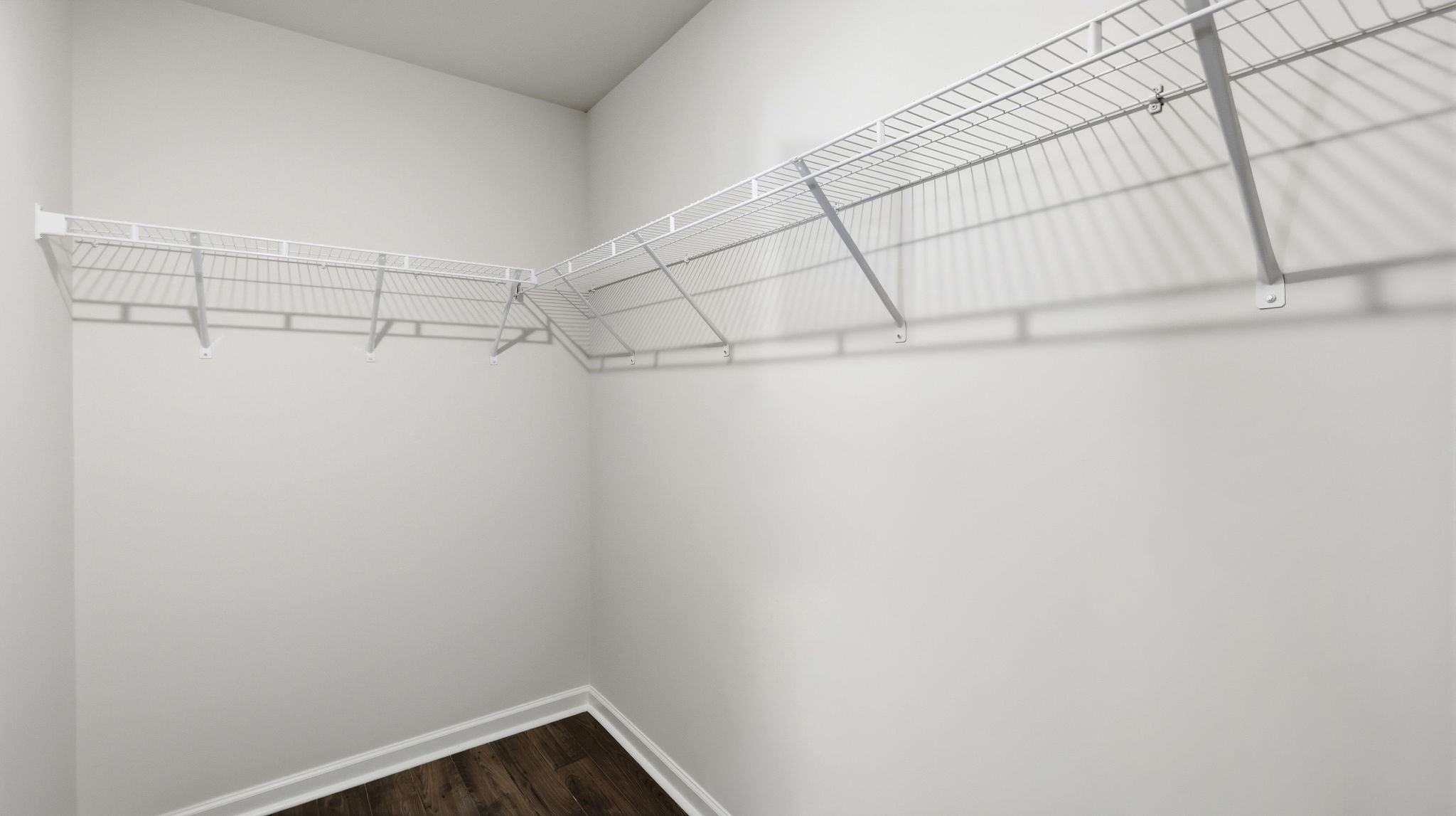 Walk in closet with shelving