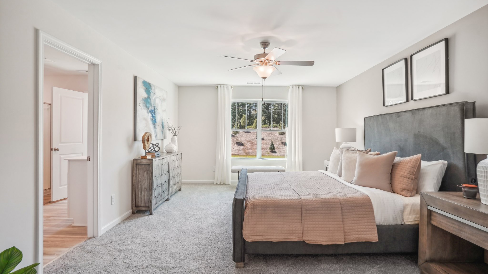 Model carpeted bedroom with small windowModel carpeted bedroom with small window