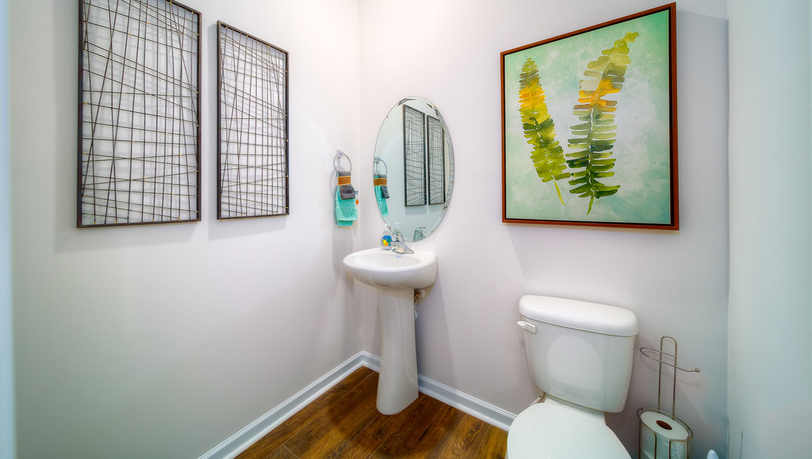 powder bathroom with small sink and toilet