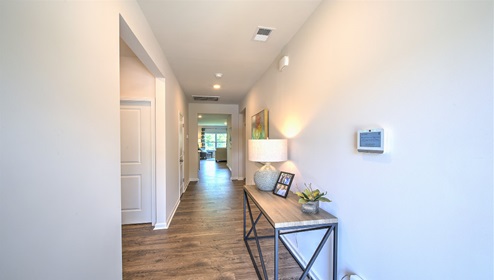 Welcoming foyer with wood floors, view of home interior