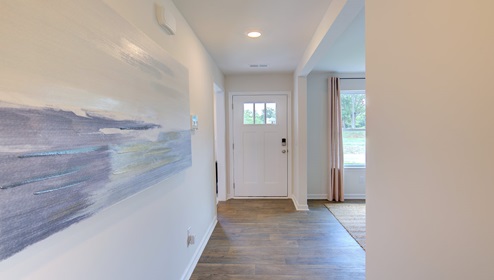 Welcoming foyer view of front doorway