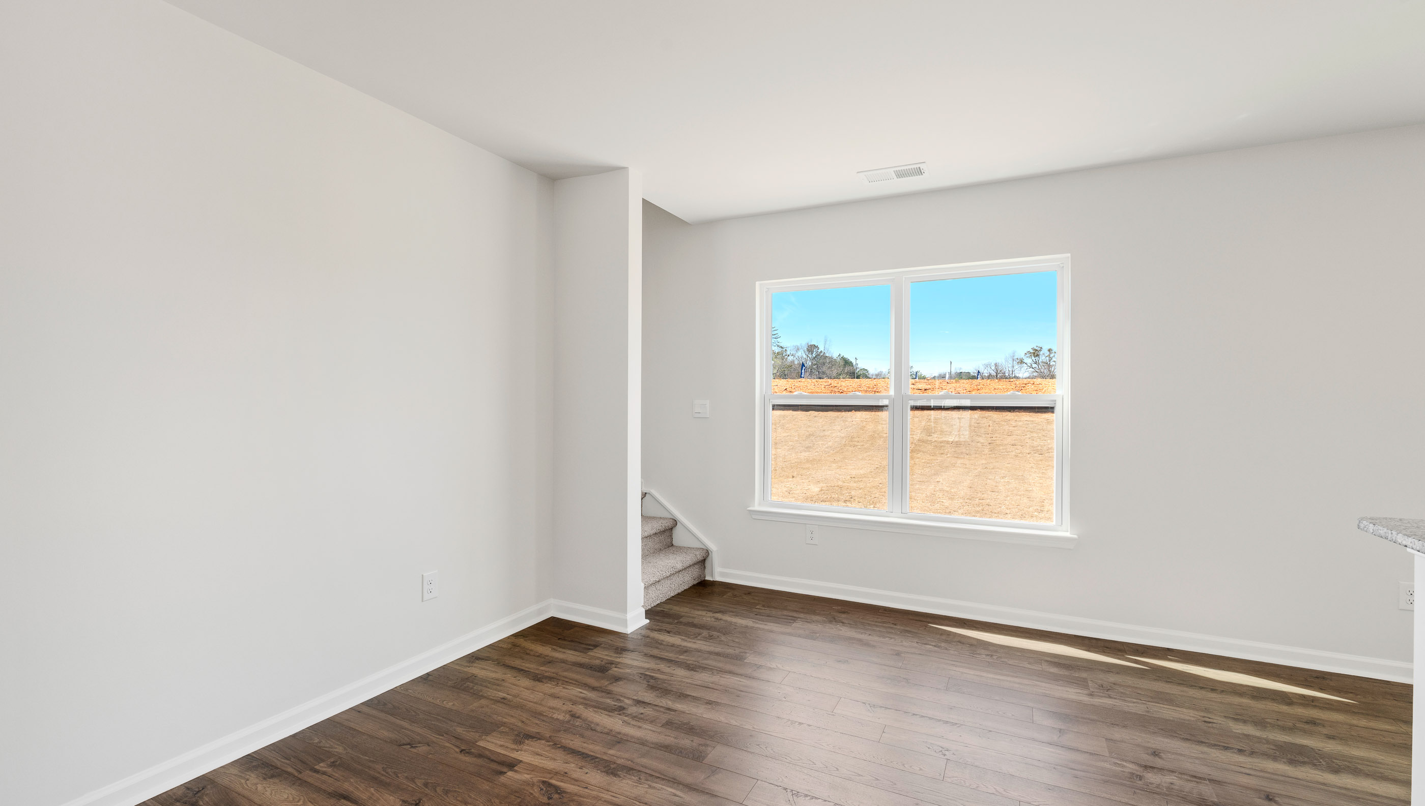 Open living area with windows